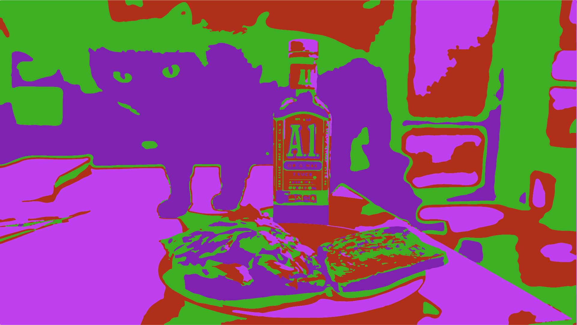 A glorious black cat hovering over delicious Kraft-Heinz A1 Steak Sauce